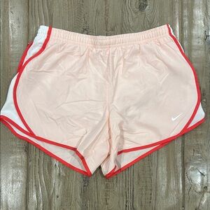 Nike Women's Light Pink Athletic Shorts with Red Trim